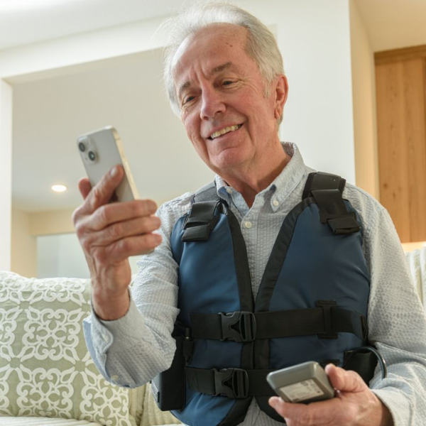 smiling man with afflovest